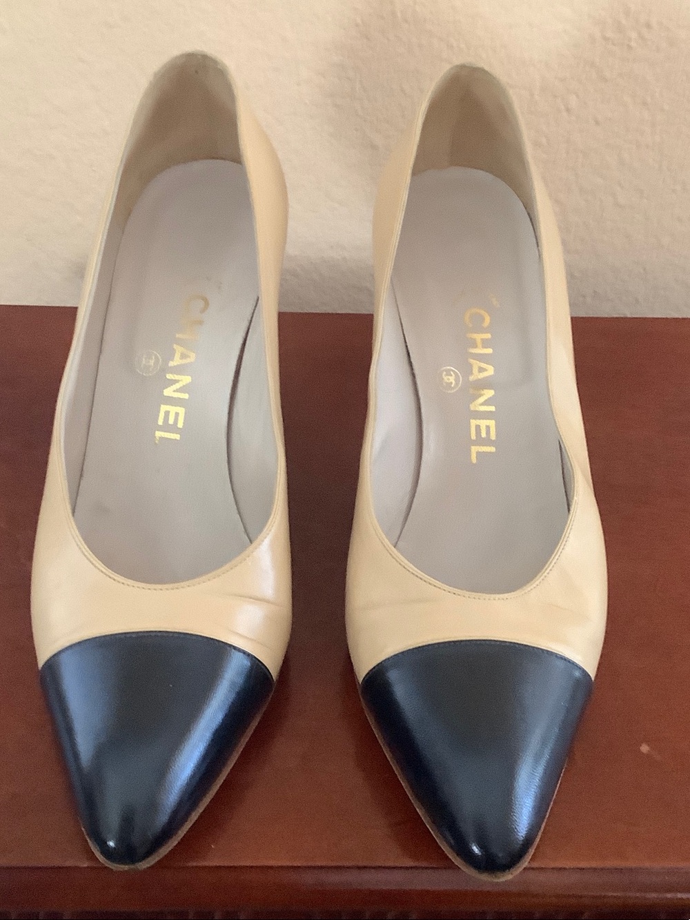 CHANEL Beige and Black Pointed Toe Leather Pumps